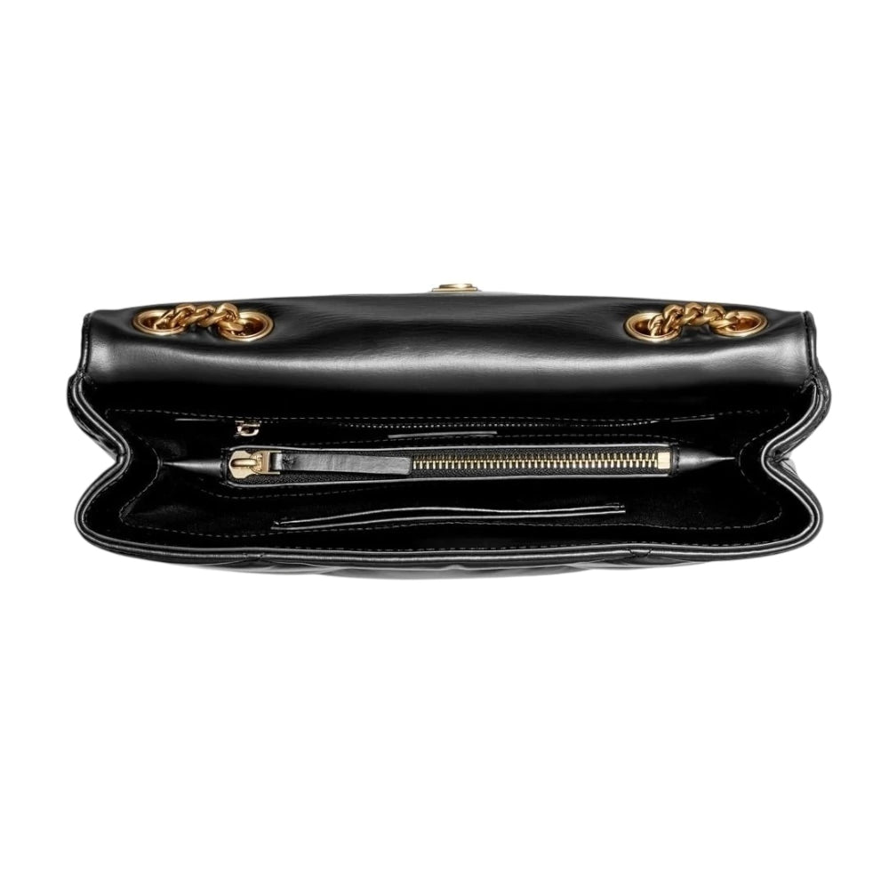 Bolsa Crossbody Tory Burch color negro con doble asa dorada ajustable